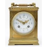 An early 20th century French brass case carriage/mantel clock, of square form having painted