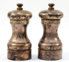 A pair of silver salt and pepper grinders, London 1995, with Peter Piper Super Saltmill and