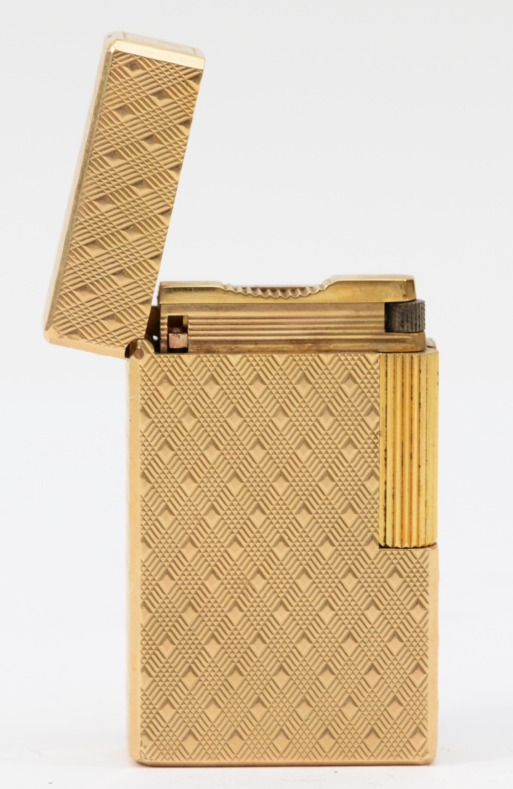 S.T. Dupont, Paris, a gold plated gas lighter, R5EH26, with cross hatched body, 5.8cm