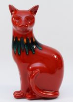 A Poole Pottery red flambe Delphis cat figure, 29cm high, (boxed)