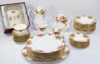 An extensive Royal Albert Old Country Roses dinner service comprising of teapot, coffee pot,