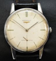 Longines, a stainless steel manual wind gentleman's wristwatch, c. 1960's, ref 8888 31, the silvered