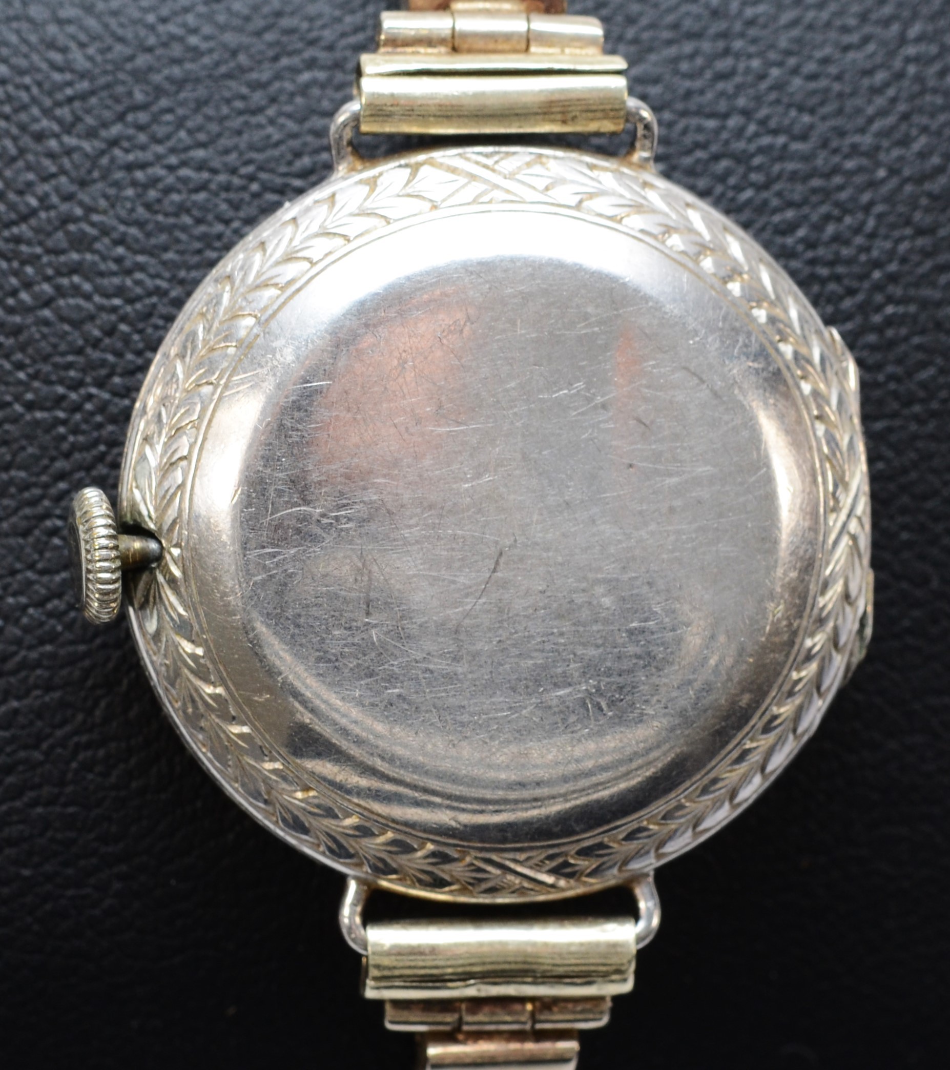 A platinum and diamond maual wind ladies wristwatch, c.1930's, silvered dial with Arabic numerals, - Image 5 of 6