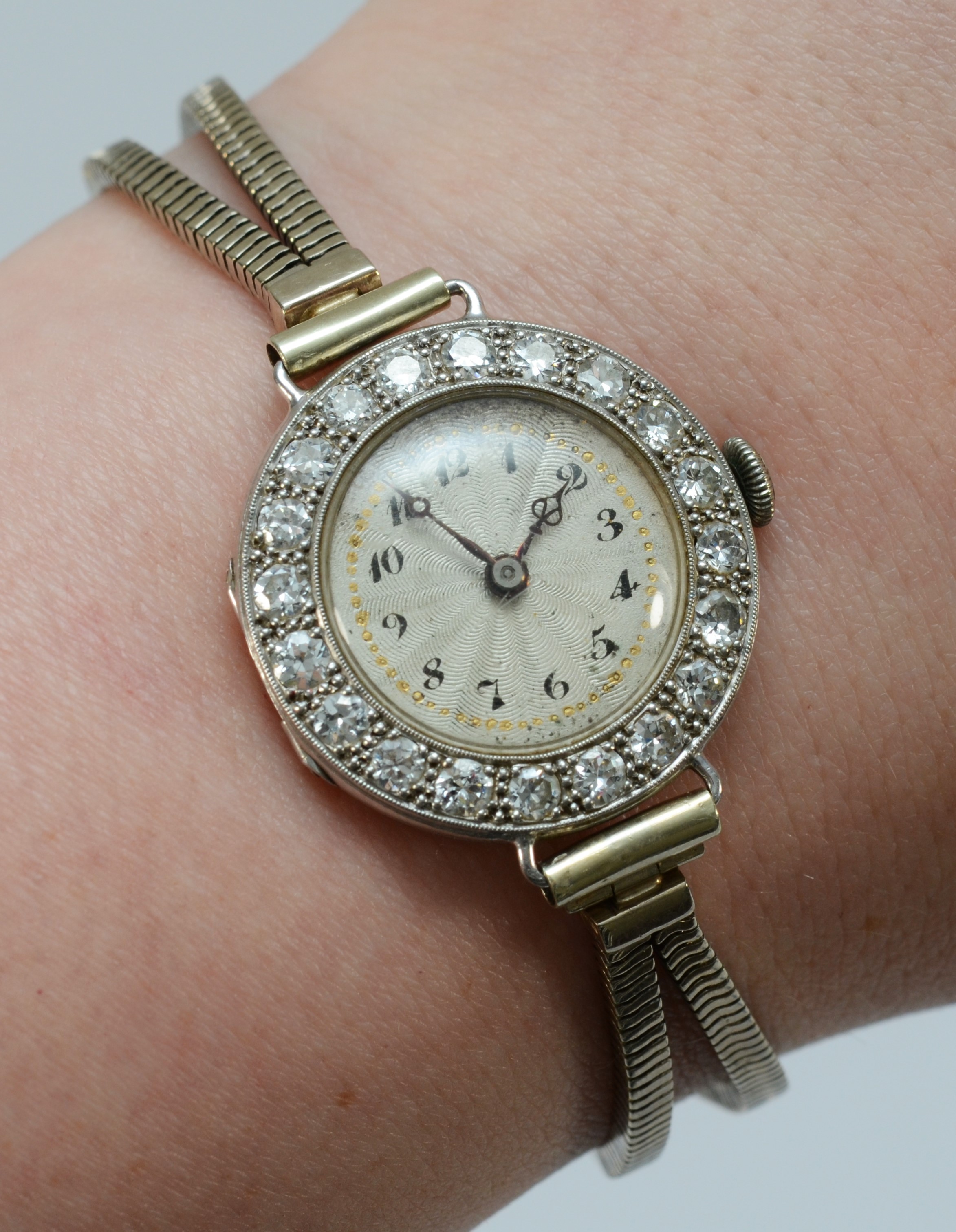 A platinum and diamond maual wind ladies wristwatch, c.1930's, silvered dial with Arabic numerals, - Image 6 of 6