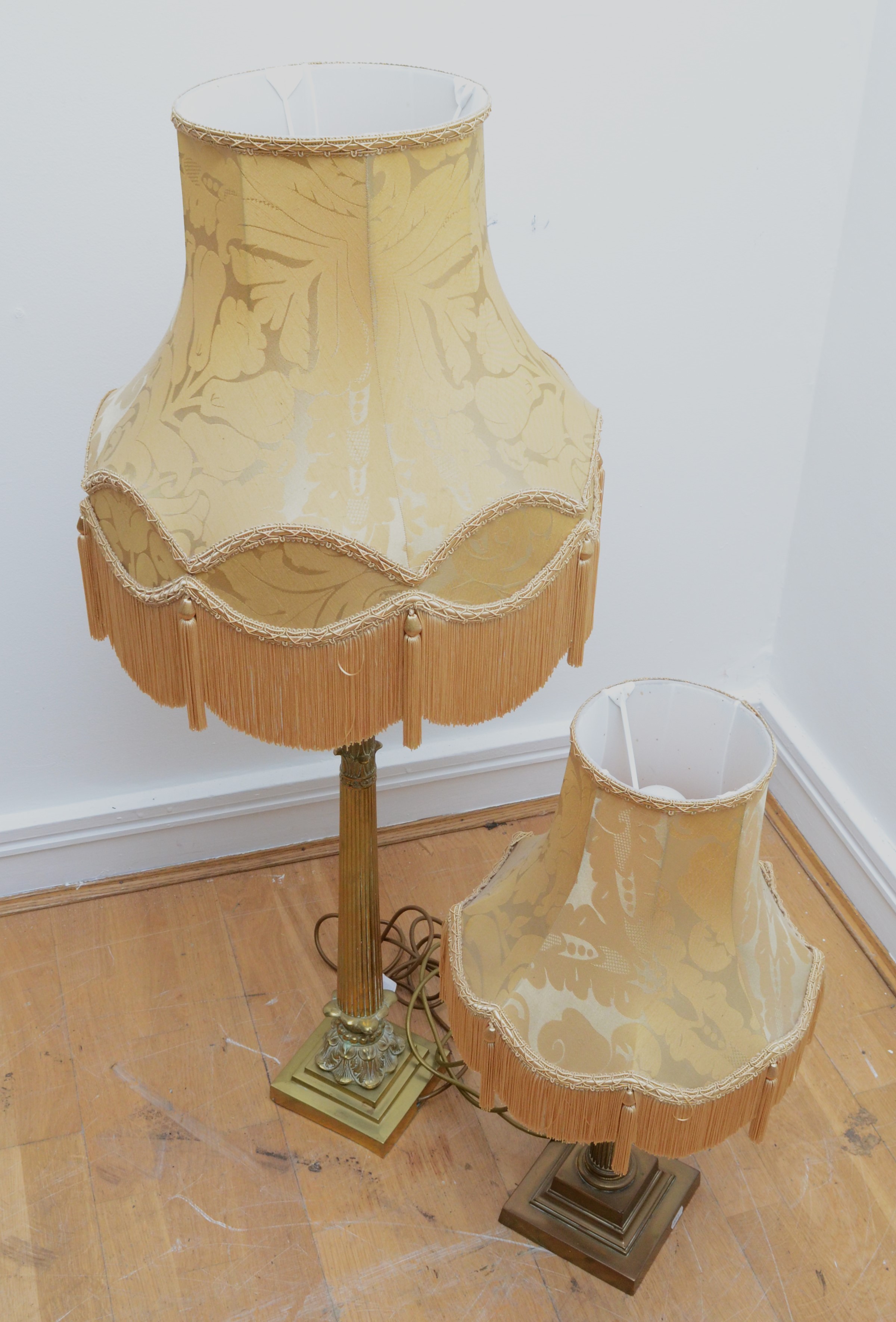 A tall gilt brass table lamp, in the form of Corinthian column on a stepped base, with tassel fabric - Image 2 of 2