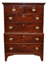 A Georgian mahogany chest on chest, the top section with two short over two two long drawers with