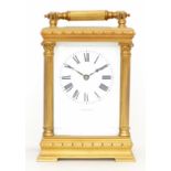 An early 20th century large gilt brass carriage clock, the 8 day movement stamped 'Made In France'