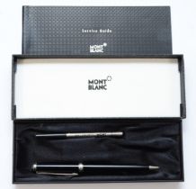 Mont Blanc, a black Noblesse ball point pen, with spare refill, case, service book dated 2002.