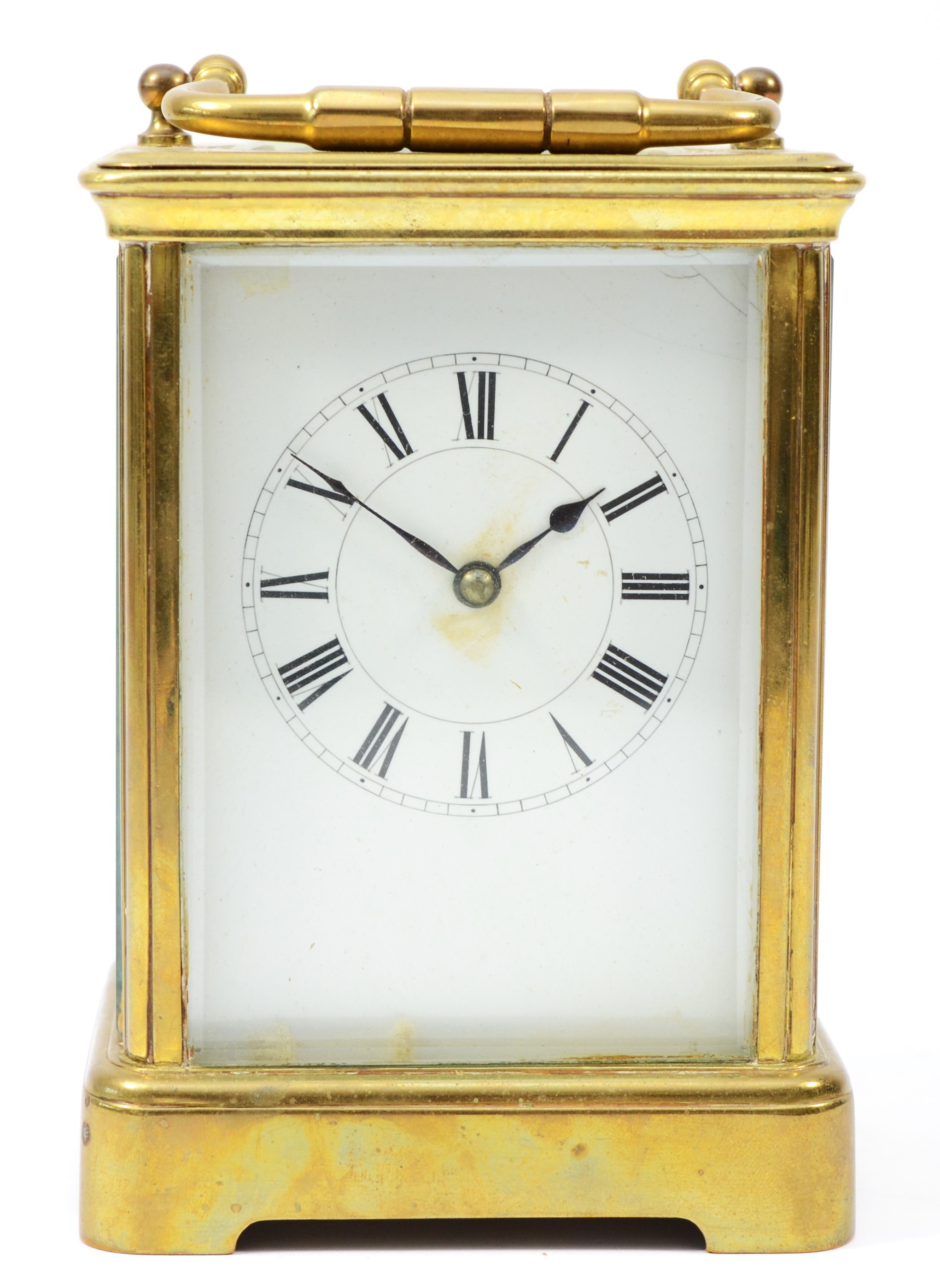 An early 20th century brass case carriage clock, having enamelled dial with Roman numerals, the 8
