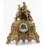 A 20th century Italian Imperial style gilt cast brass mantel clock, two lovers above scrolling