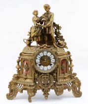 A 20th century Italian Imperial style gilt cast brass mantel clock, two lovers above scrolling