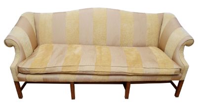 A late 19th century camelback three seater sofa, upholstered in gilt damask fabric, having out-