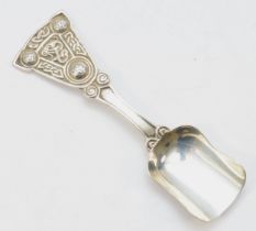 A Scottish silver Celtic caddy spoon, by A.L, Edinburgh 1949, untraced, with cast handle, 11.5cm,