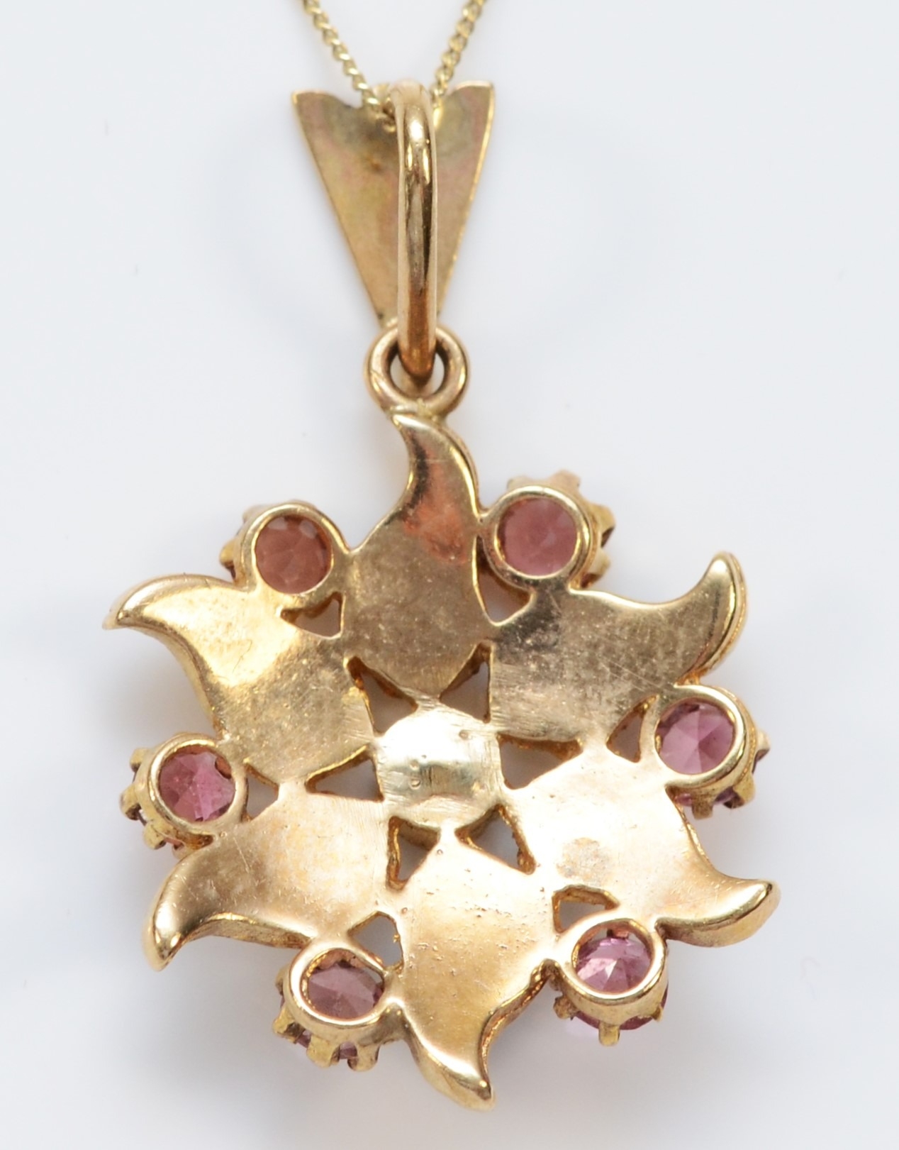 An unmarked Victorian style rose gold pink tourmaline and half pearl pendant, diameter19mm, chain, - Image 2 of 2