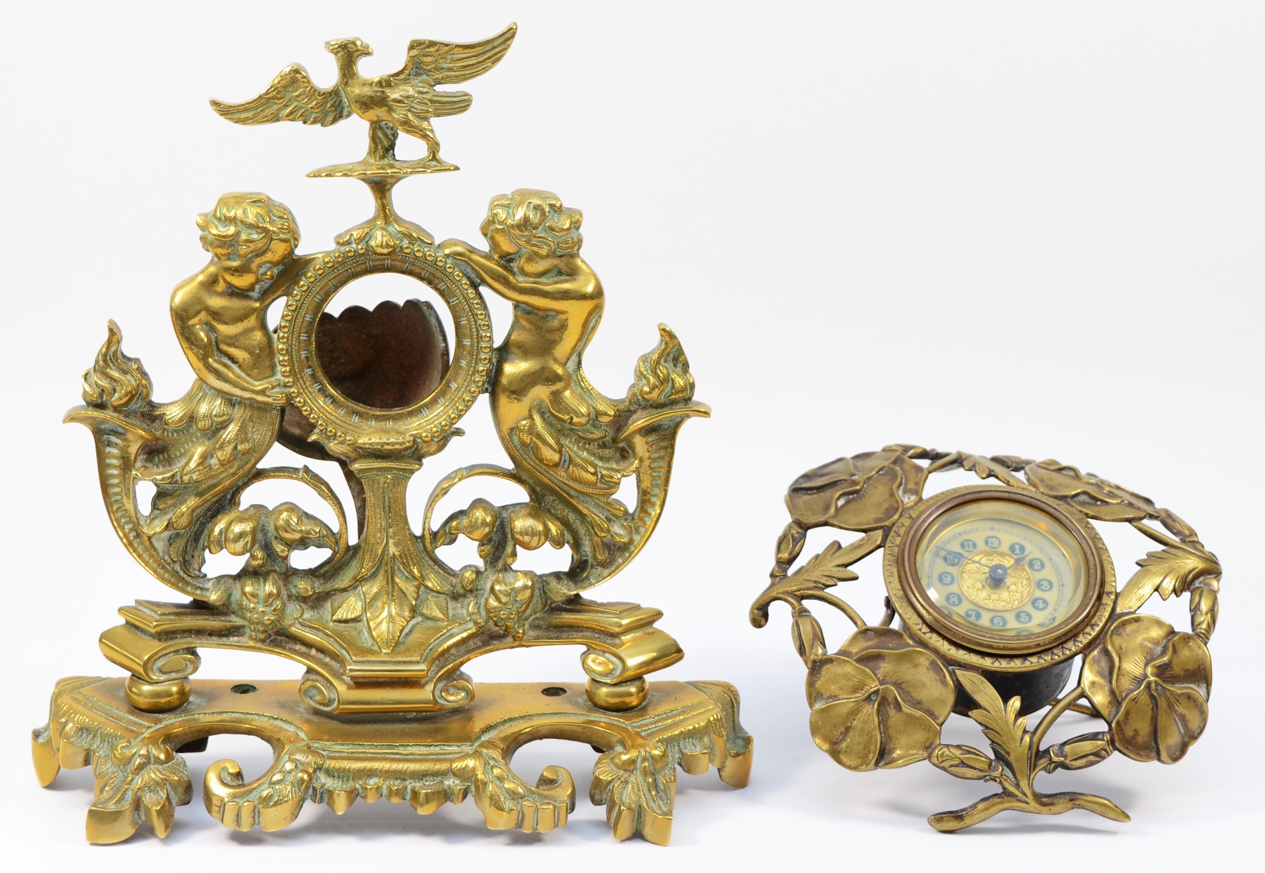 A late 19th Century brass desk top pocket watch stand, comprising of laurel wreath with scrolls