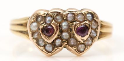 A Victorian 9ct gold ruby and half pearl double heart ring, Birmingham 1899, N 1/2, 1.8gm