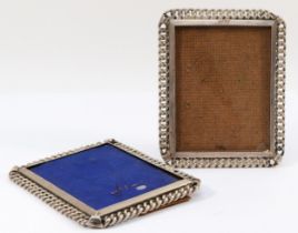 A Victorian silver pair of photograph frames, Birmingham 1900, with curb link border, strut backs,