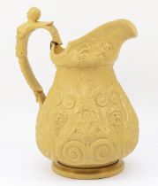 A 19th century Charles Meigh style stoneware water jug, relief moulded with Bacchus masks,