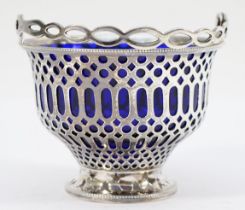 A silver swing handle sugar basket, by Barker Bros., Chester 1917, with pierced body and