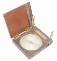 A 19th century mahogany cased surveyor's compass, having silvered dial, brass folding sights with