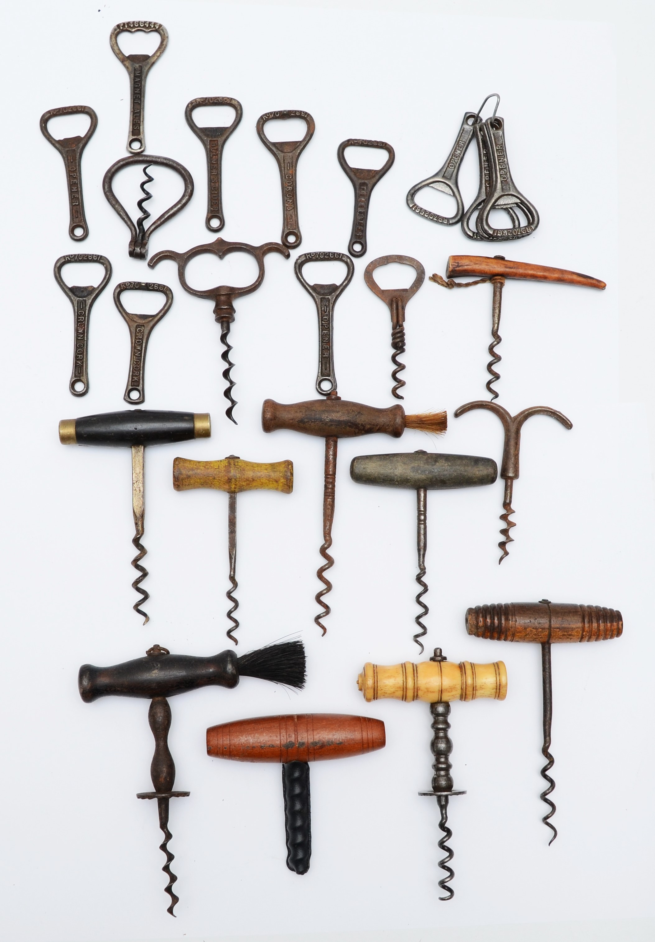 A collection of early 20th century and later corkscrews/bottle openers, including T-handle