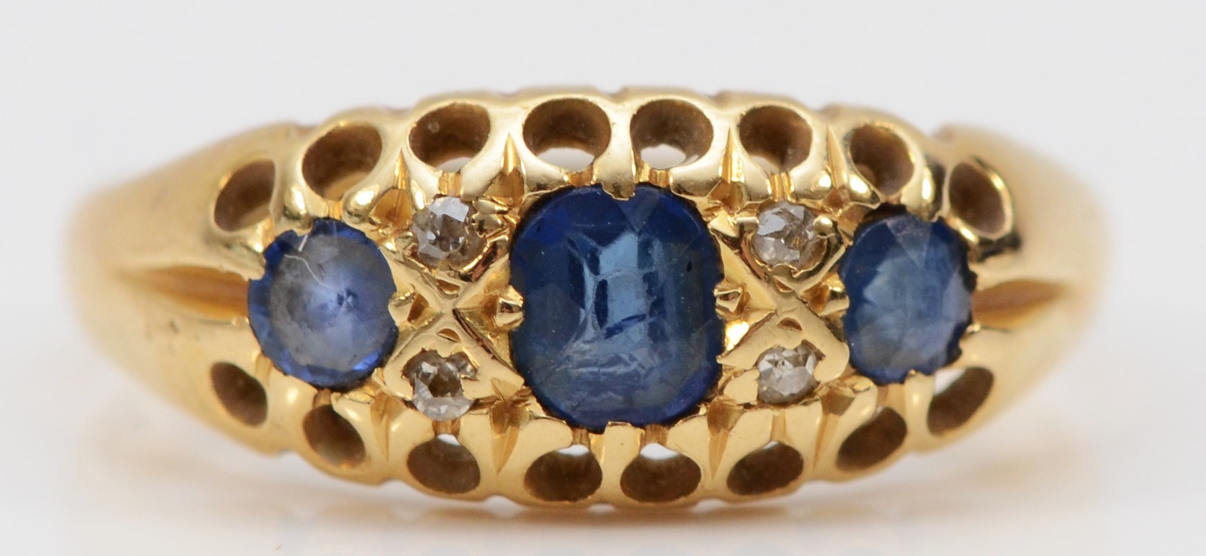An Edwardian 18ct gold sapphire and old cut diamond ring, L, 2.5, makers mark only, the remainder