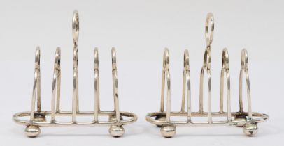An Edwardian silver pair of four division toast racks, by Dixon Bros., Sheffield 1904, 8cm, 90gm