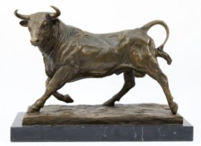 A large bronze model of a Bull, signed 'Milo' with foundry mark, upon a rectangular polished