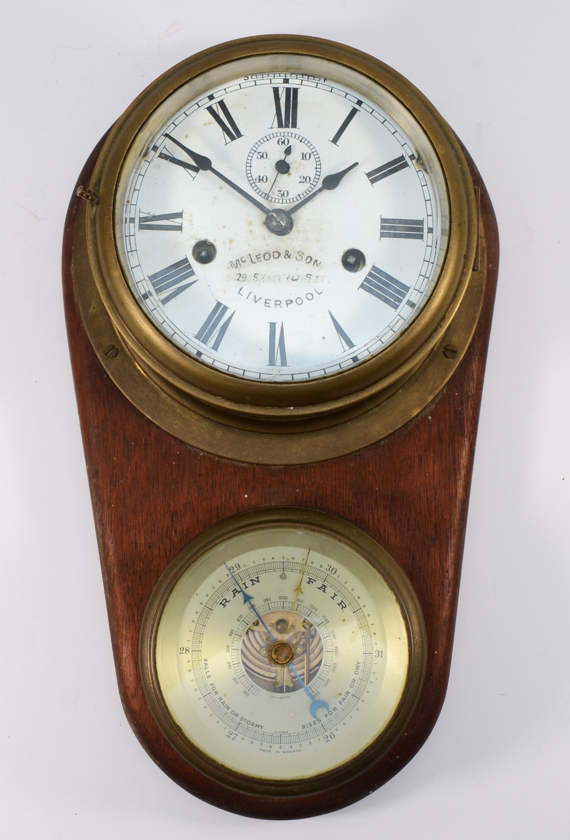 A 20th century combination brass bulkhead clock and barometer, retailed by Mcleod & Son Liverpool,