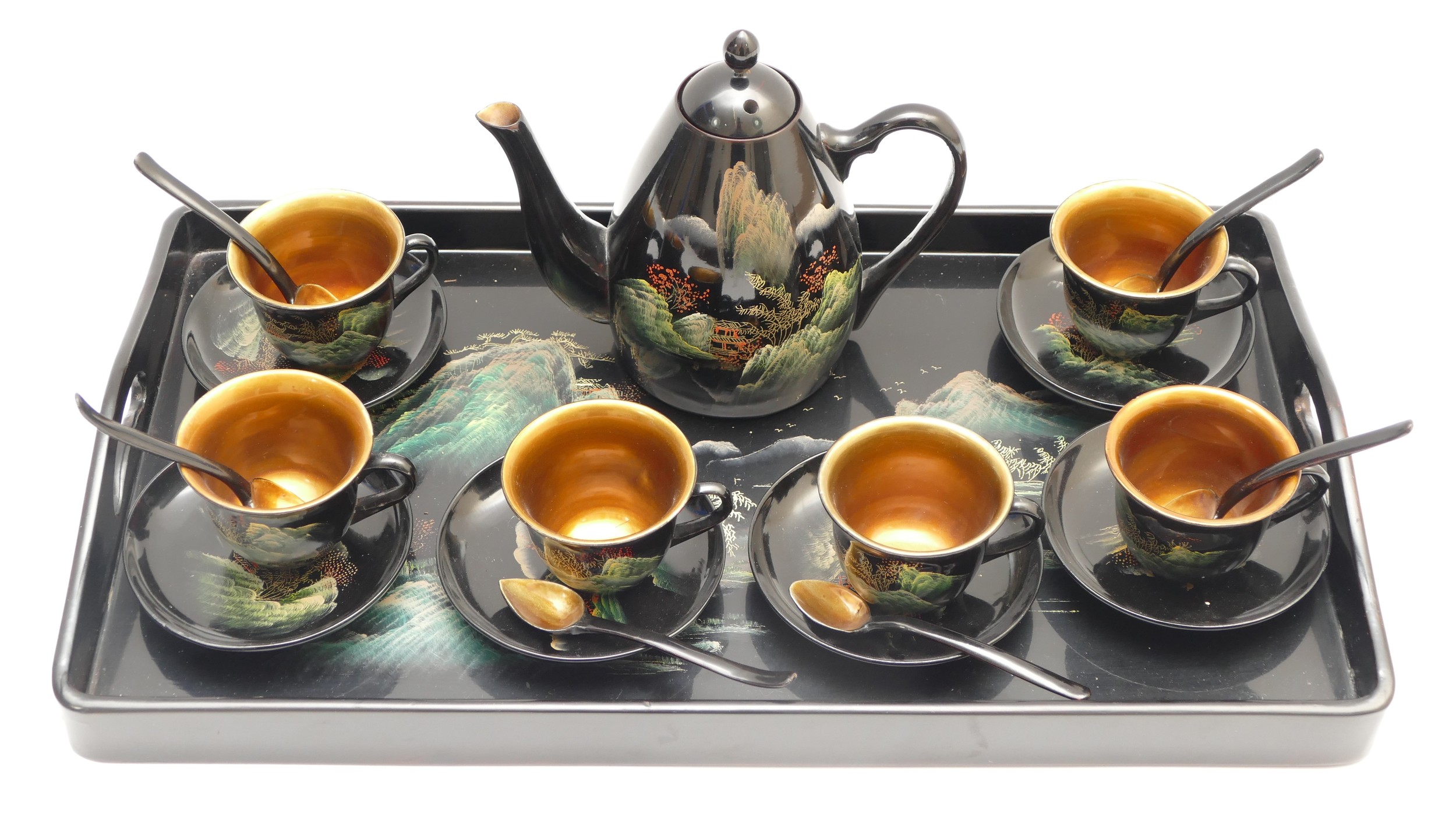 A Japanese lacquerware tea set comprising of a tray, teapot, six tea cups with saucers and tea