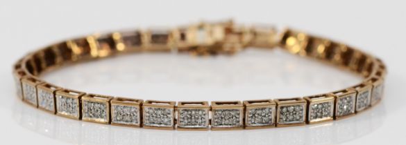 A 9ct yellow gold and diamond set panel link bracelet, each with six single cut stones, stated