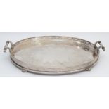 A Victorian electroplated large two handled tea tray, unmarked, with cast floral handles, pierced