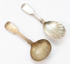 A Victorian silver fiddle pattern caddy spoon, London 1849 with floral engraved bowl and a Victorian