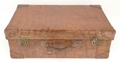 A large reptile skin suitcase, late 19th early 20th century. 66x41cm.
