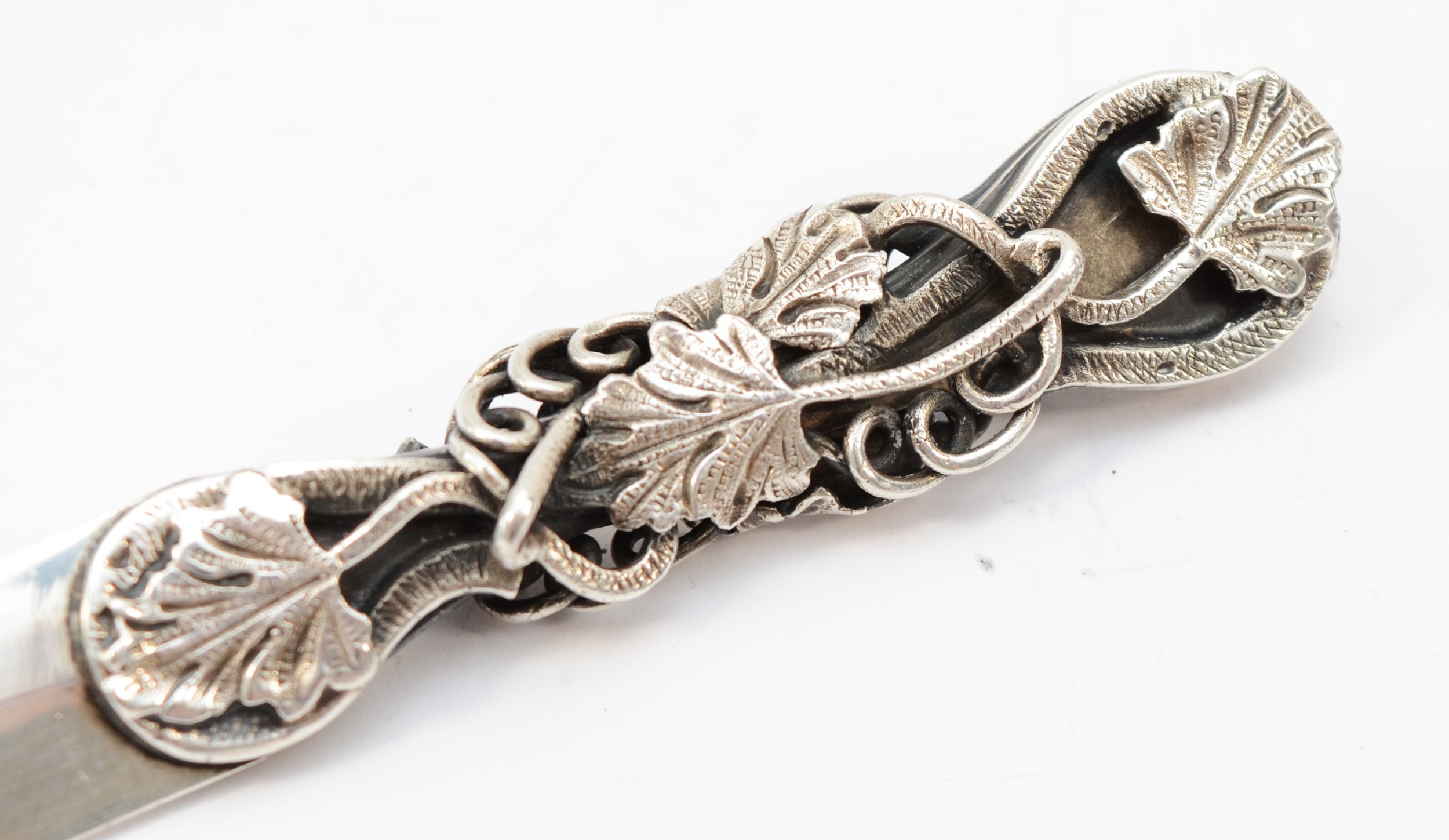 A silver letter opener, by Warwickshire Reproduction Silver, Birmingham 1970, with cast vine leaf - Image 4 of 5