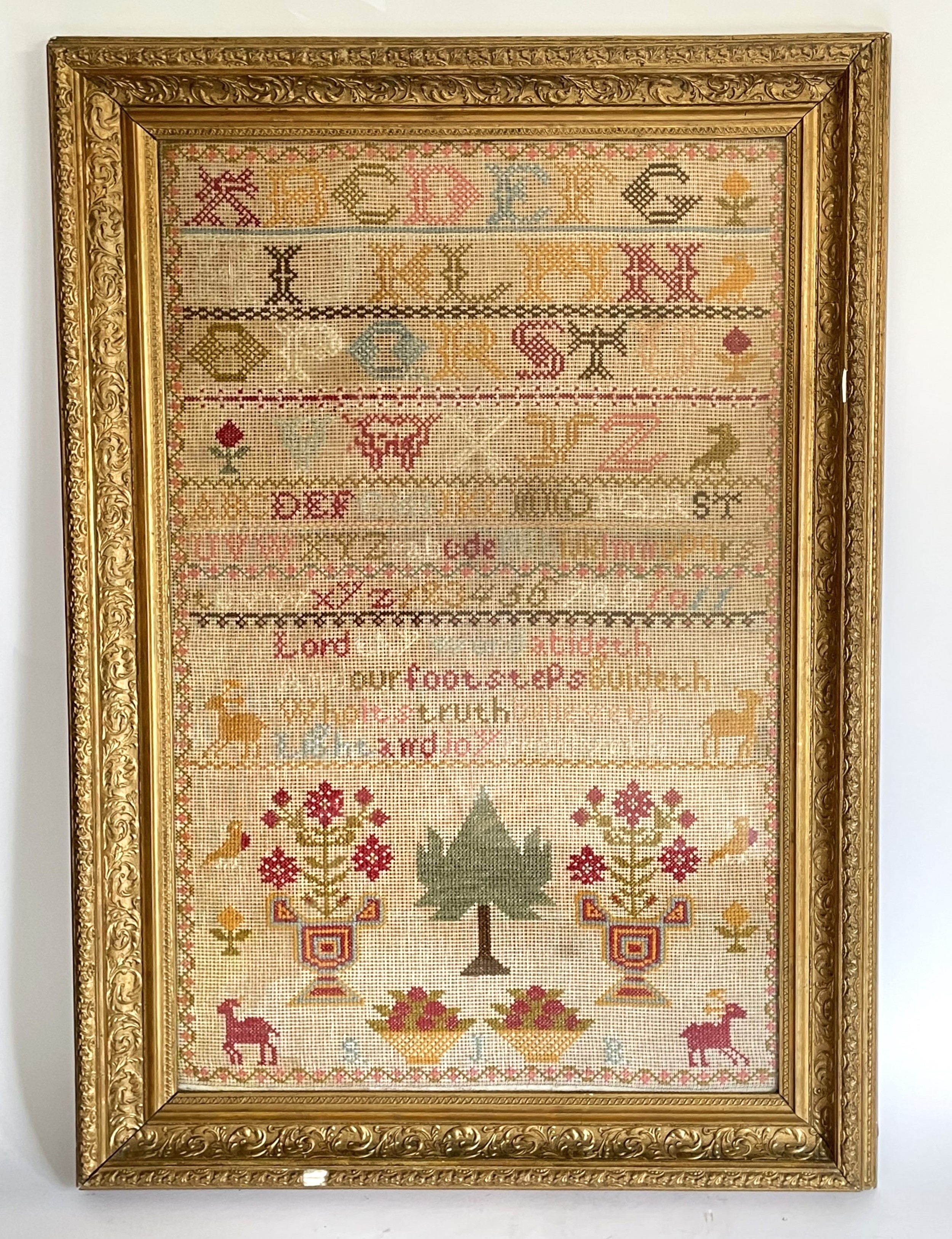 A Victorian sampler, embroidered with the alphabet, a pray, and other motifs, initialled S.J.B.,