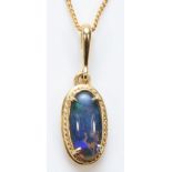 A 14K gold mounted opal triplet pendant, 12mm 9ct gold chain, gross weight 2.8gm