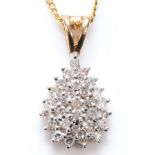 A 9k gold and diamond set pear shape pendant, 14mm, chain, 1.7gm