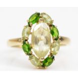 A 9ct gold citrine and diopside cluster ring, P, 3gm