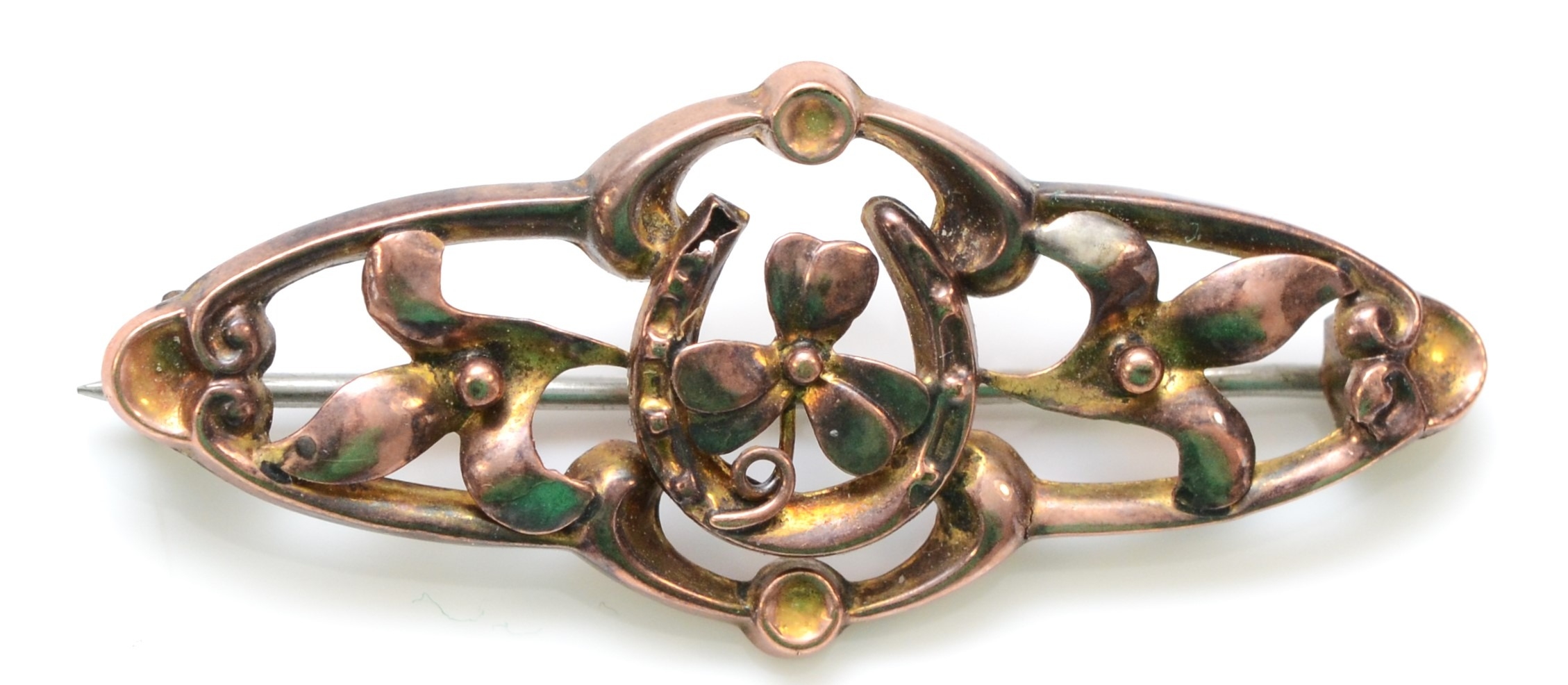 An Edwardian 9ct rose gold horseshoe and shamrock openwork brooch, 41mm, 1.6gm
