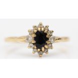 A 9ct gold sapphire and diamond cluster ring, O, 1.8gm