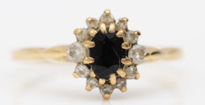 A 9ct gold sapphire and diamond cluster ring, O, 1.8gm