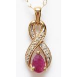 A 9ct gold ruby and diamond pendant, 18mm overall, chain, 1.2gm