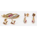 A 375 gold pink sapphire and eight cut diamond floral brooch, 33 x 10mm, with a pair of matching