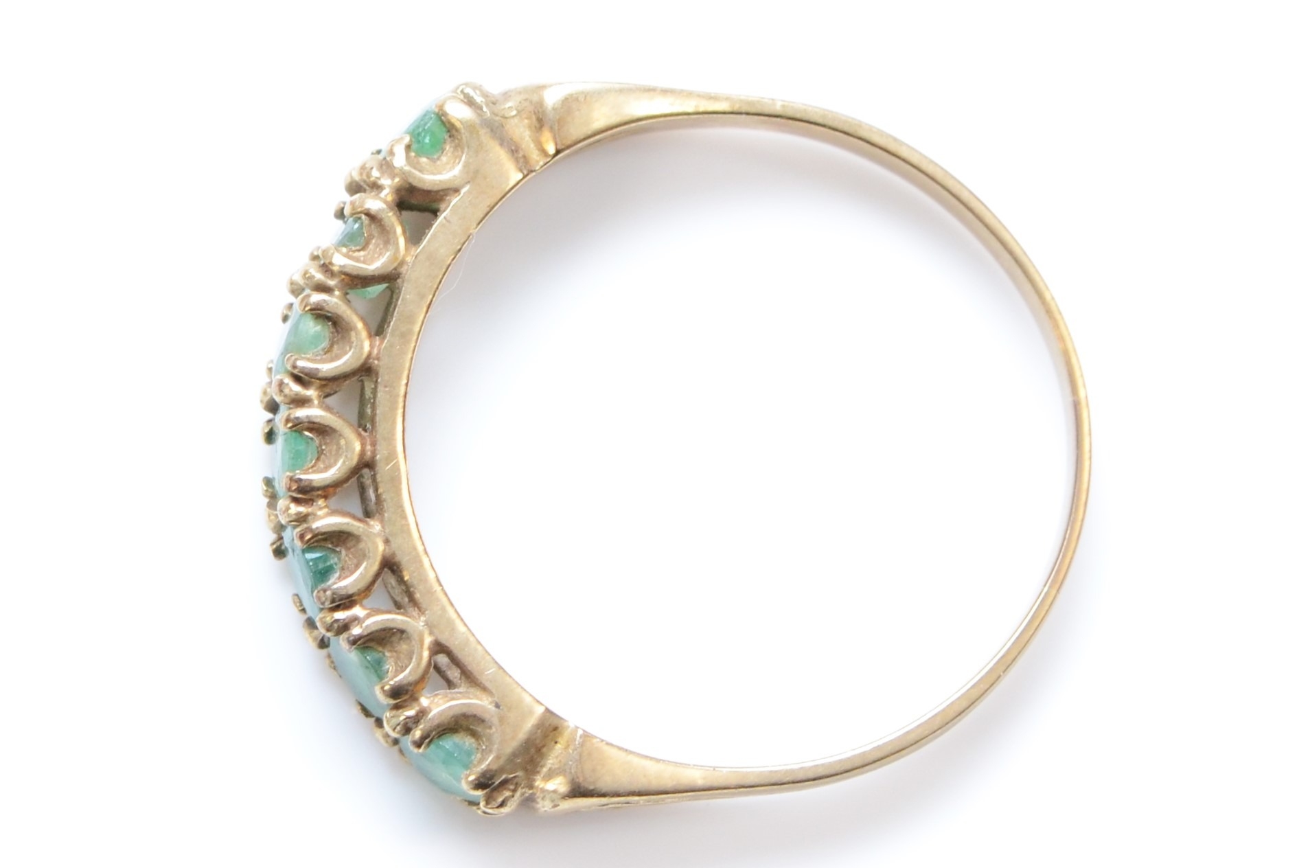 A 9ct gold and emerald half eternity ring, R, 2.1gm - Image 2 of 2