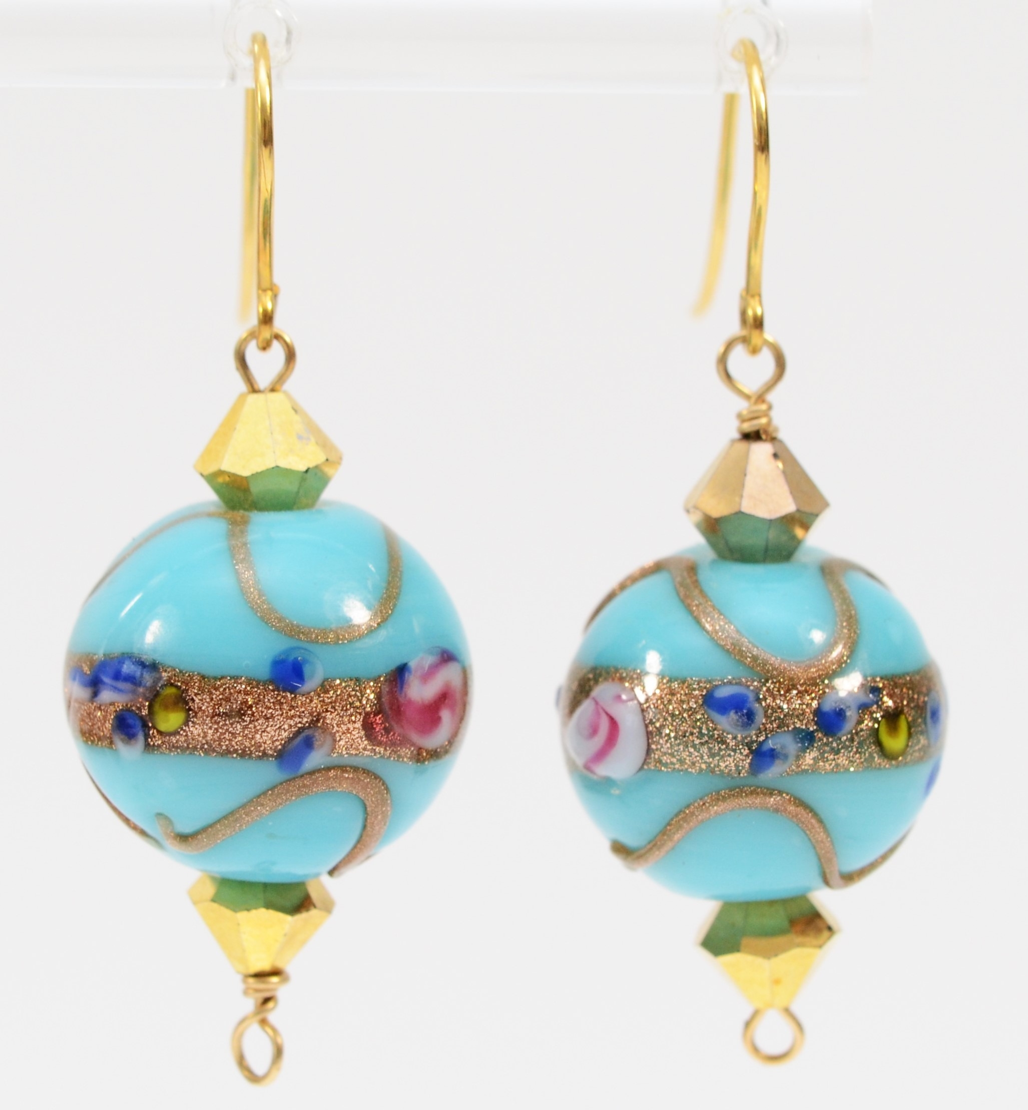 A 9ct gold mounted pair of 15mm glass bead ear rings