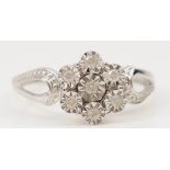 A 9ct white gold and diamond cluster ring, L 1/2, 2gm