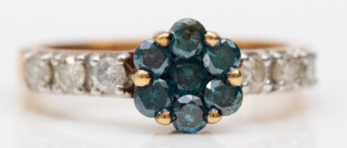 A 9ct gold, enhanced blue brilliant diamond and diamond cluster ring, P, 3gm