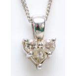 A 9ct white gold brilliant cut and Princess cut diamond pendant, stated weight 0.12ct, chain, 1.1gm