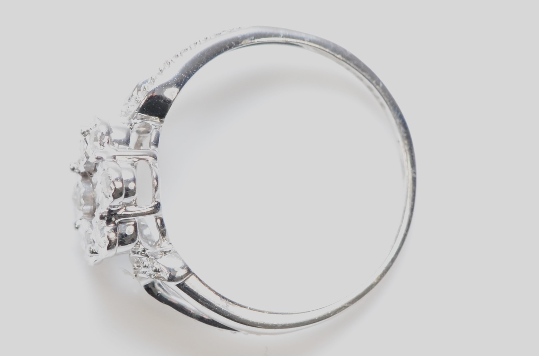 A 9ct white gold and diamond cluster ring, L 1/2, 2gm - Image 2 of 2